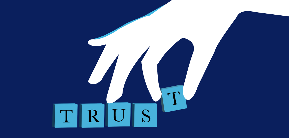graphic of hand placing letters to spell "trust"